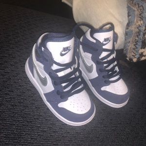 Toddler Jordan 1 Navy, white, and silver.